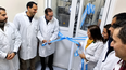 Alicia Romero de Colusi, presidenta de Bedson SA junto al personal de la empresa en la inauguración formal del nuevo sistema Integral de mezclado de polvos, en la planta de Pilar.